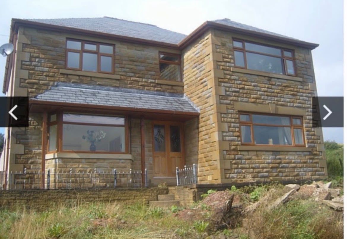 Stone house renovation exterior